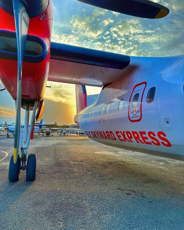 Skyward Airlines aircraft at sunset
